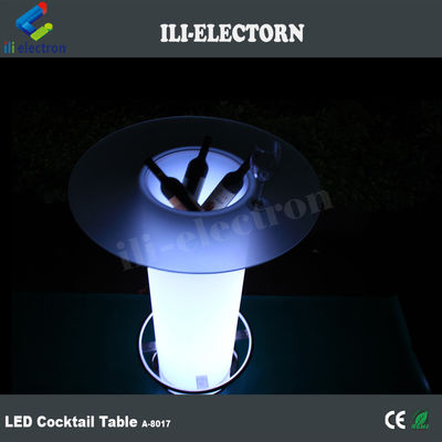 Mesa de cóctel de vidrio LED, iluminada con cubos de hielo.