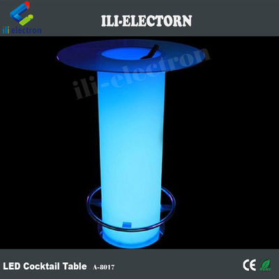 Mesa de cóctel de vidrio LED, iluminada con cubos de hielo.